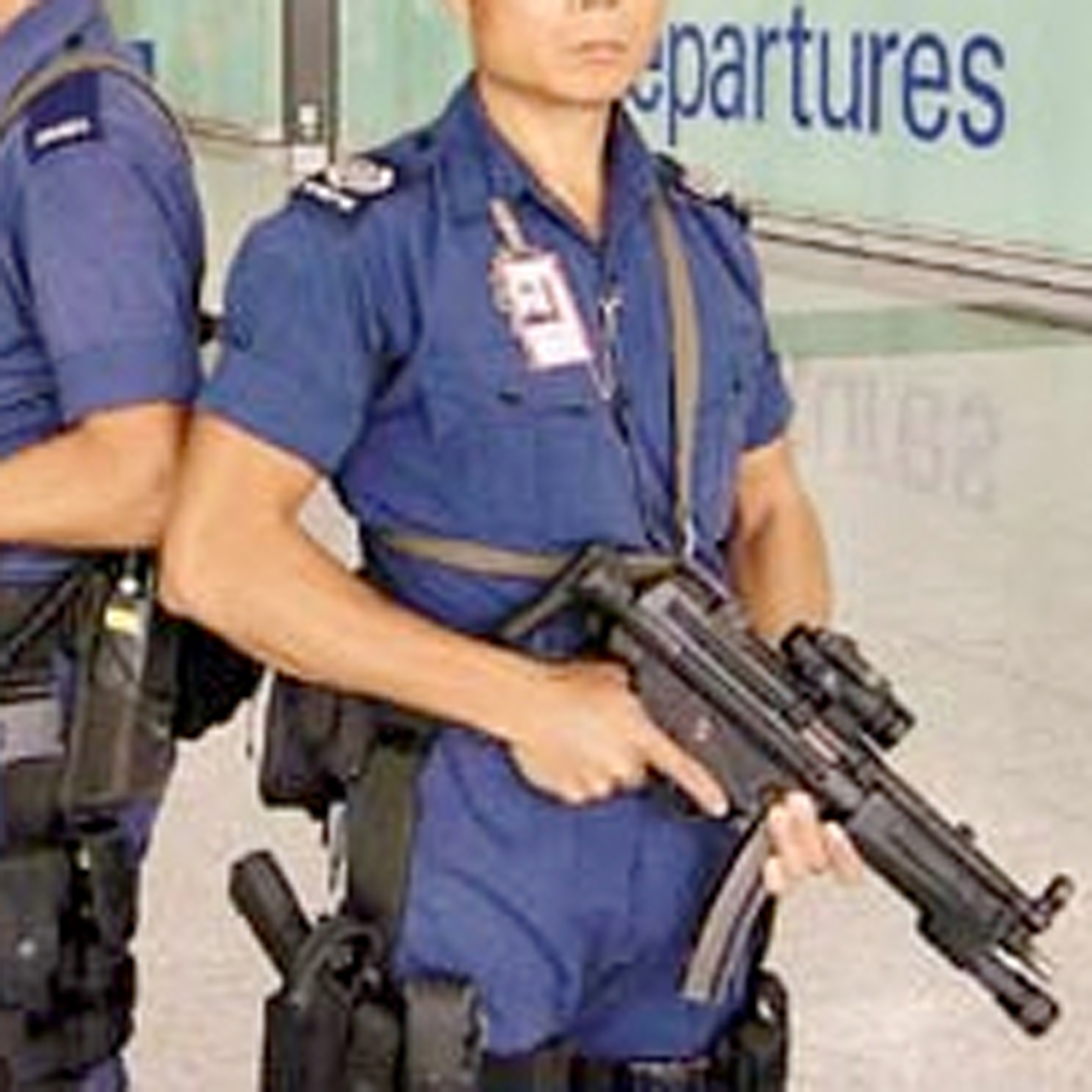 Asians wielding their big weapons at Hong Kong airport!